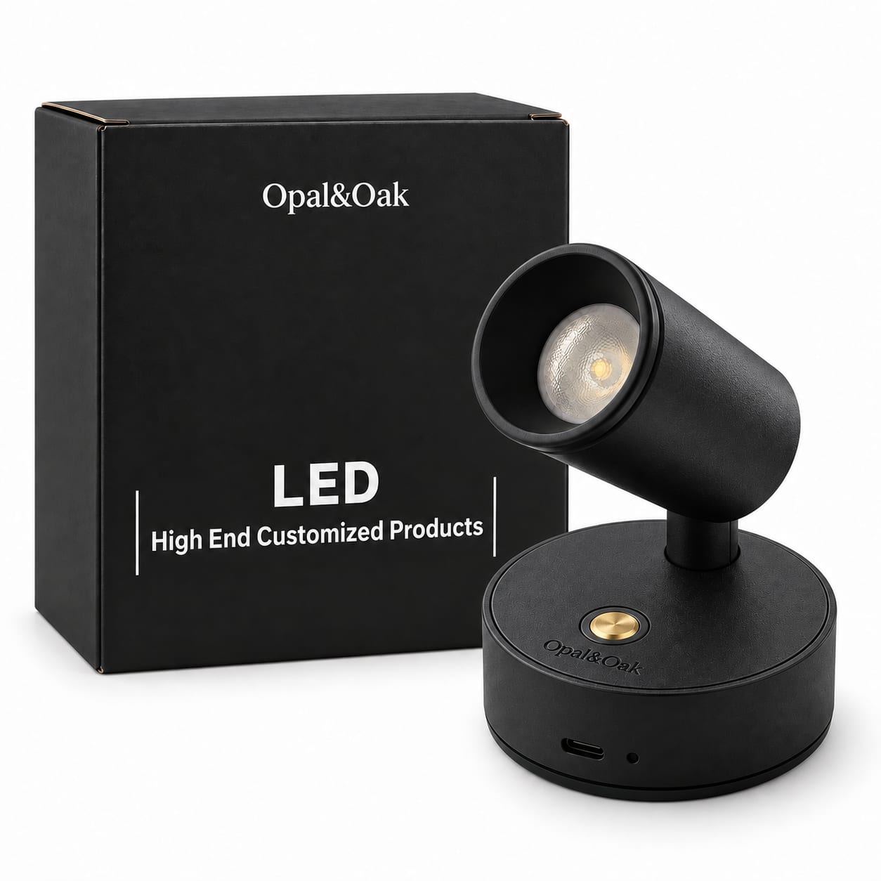The black spotlight standing beside the box it is supplied in, the Opal&Oak name printed across the top of the box front